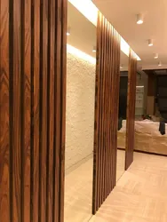 Slats in the interior of the hallway with a mirror