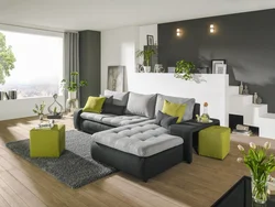 Green-gray wallpaper in the living room interior
