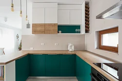 Emerald with beige in the kitchen interior