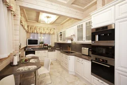 White kitchen in the interior of a wooden house