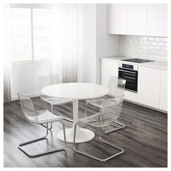 Round gray table in the kitchen interior