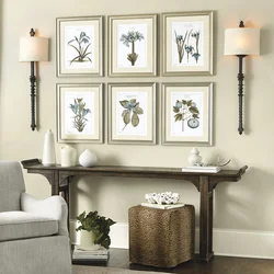 Wall with frames in the kitchen interior