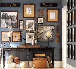 Wall with frames in the kitchen interior