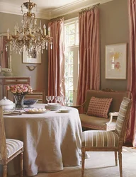 Curtains with roses in the kitchen interior