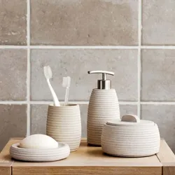 Ceramic accessories for the bathroom in the interior