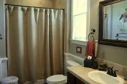 White curtain in the bathroom in the interior