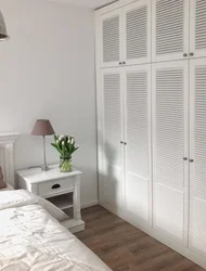 Louvered door to the dressing room in the interior
