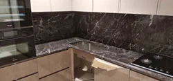Markvina black countertop in the kitchen interior