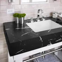 Markvina black countertop in the kitchen interior