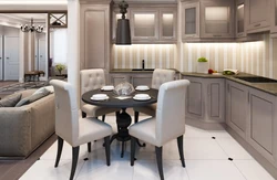 Dark table in the interior of a light kitchen