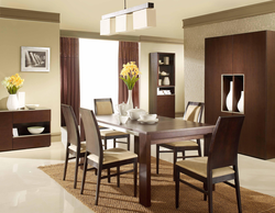 Dark Table In The Interior Of A Light Kitchen