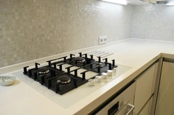 Black hob in the kitchen interior