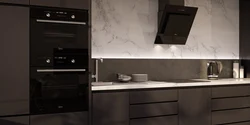 Black hob in the kitchen interior