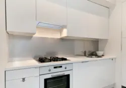 Black hob in the kitchen interior