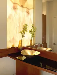 Onyx and wood in the bathroom interior