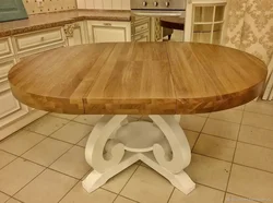 Oak table in the kitchen interior