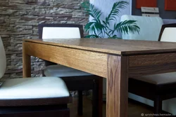 Oak table in the kitchen interior