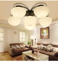 Chandelier with flowers in the living room interior