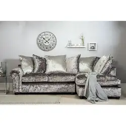 Velor corner sofa in the living room interior