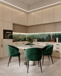 Green chairs in the interior of a gray kitchen