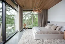 Bedroom interior with floor-to-ceiling windows