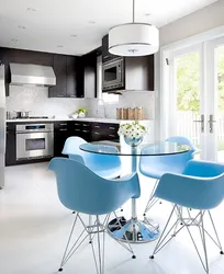 Gray table and chairs in the kitchen interior