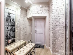 Brick wall in the interior of the hallway with your own