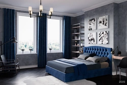 Curtains in the interior of a bedroom with a blue bed