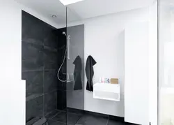 Black Shower Cabin In The Interior Of A White Bath