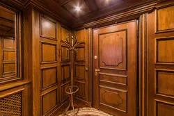 Wooden interior from doors to kitchen