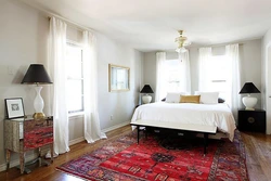Carpets in the bedroom interior and curtains