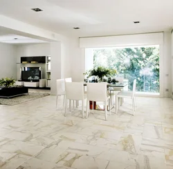 Marble-effect porcelain tiles in the living room kitchen interior