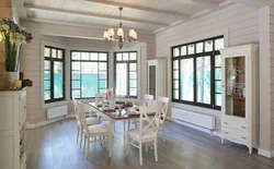 White kitchen interior in a timber house