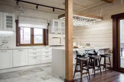 White kitchen interior in a timber house