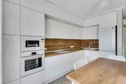 Kitchen without handles white glossy in the interior