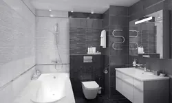 Bathroom interior with gray and black tiles