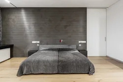 Gray laminate on the wall in the bedroom interior
