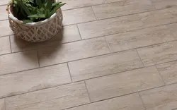 Wood-look porcelain tiles for the kitchen floor photo