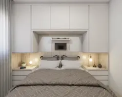 Bedroom design with built-in wardrobe and bed