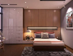 Bedroom design with built-in wardrobe and bed