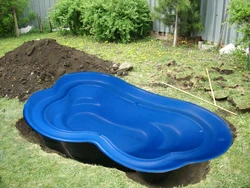 Plastic bathtub for a summer residence photo