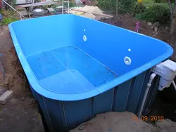 Plastic bathtub for a summer residence photo
