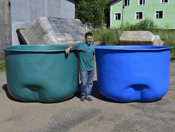 Plastic bathtub for a summer residence photo