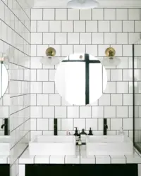 White tiles in the bathroom with white grout photo