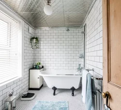 White tiles in the bathroom with white grout photo