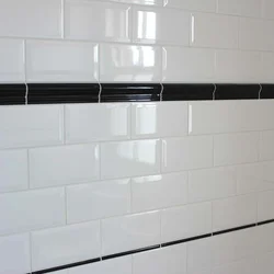 White Tiles In The Bathroom With White Grout Photo