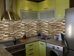 Self-adhesive panels for walls in the kitchen interior photo