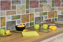 Self-adhesive panels for walls in the kitchen interior photo