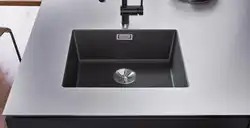 Kitchen Sinks Built Into A Stainless Steel Countertop Photo