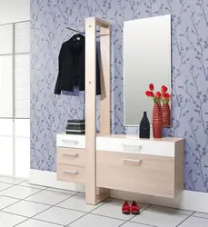 Hallway design with cabinet and mirror